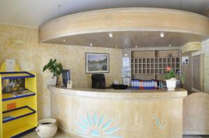 Vstupní hala nebo recepce v ubytování Hotel Su Giganti