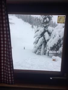 Urige Almhütte Innerkrems v zimě