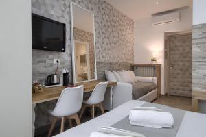 TV a/nebo společenská místnost v ubytování Vatican Treasure