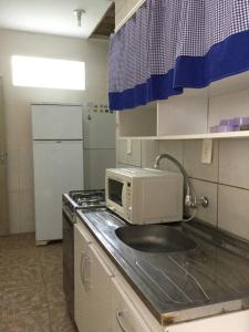 A kitchen or kitchenette at Venha para Florianópolis