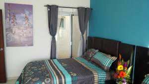 Postel nebo postele na pokoji v ubytování Suites Sta Tere