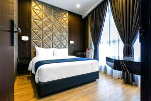 Postel nebo postele na pokoji v ubytování U3 HOTEL