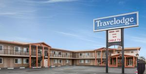 a sign in front of a hotel at Travelodge by Wyndham Eureka in Eureka