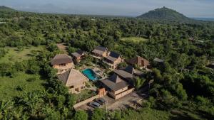 an aerial view of a house with a pool at Sun Suko Boutique Resort & Yoga Retreat in Pemuteran