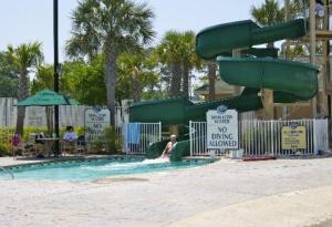 a man in a swimming pool at a water park at Unit at the Sheraton Broadway Plantation in Myrtle Beach