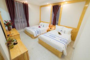 Postel nebo postele na pokoji v ubytování Starhill Hotel
