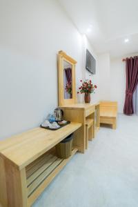 TV a/nebo společenská místnost v ubytování Starhill Hotel