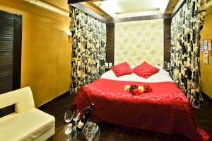 Postel nebo postele na pokoji v ubytování Hotel Omochabako (Love Hotel)