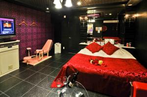 Postel nebo postele na pokoji v ubytování Hotel Omochabako (Love Hotel)