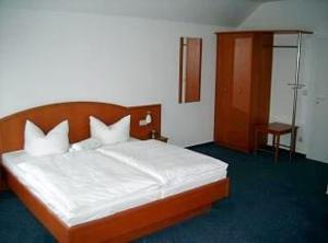 Postel nebo postele na pokoji v ubytování Hotel Kuhfelder Hof