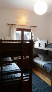 En eller flere senge i et værelse på Apartamentos Tanau