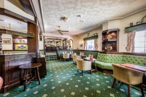 The lounge or bar area at Moorings Hotel