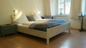 Postel nebo postele na pokoji v ubytování K-Hotel (Grüner Baum)