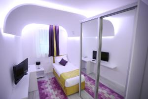 Katil atau katil-katil dalam bilik di Hotel Boutique Libris