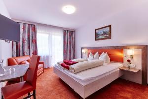 Łóżko lub łóżka w pokoju w obiekcie Apartment Bergsee