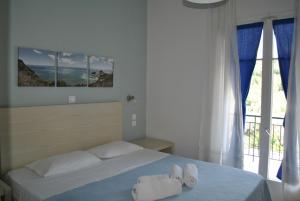 Voodi või voodid majutusasutuse Hotel Helios Splendid toas