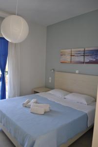 Postel nebo postele na pokoji v ubytování Hotel Helios Splendid