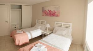 Posteľ alebo postele v izbe v ubytovaní Apartamentos Marta PLAYA