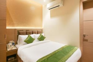 Treebo Hoops, Near Kolkata Airport客房内的一张或多张床位