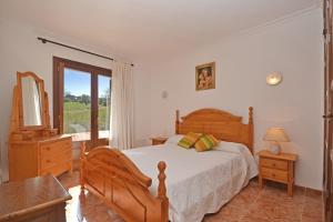 מיטה או מיטות בחדר ב-Villa Tresco