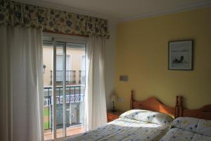 Postel nebo postele na pokoji v ubytování Hostal Ana - Adults Recommended