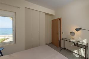 Posteľ alebo postele v izbe v ubytovaní Rodia Beach Suites