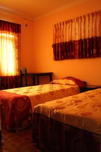 Cama o camas de una habitación en Elbrus Home