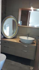 Kúpeľňa v ubytovaní Rodia Beach Suites
