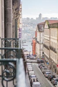 a view of a city street with parked cars at OHH -S João apartments- Riverside in Porto