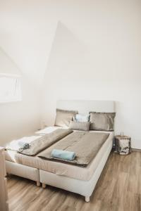 Postel nebo postele na pokoji v ubytování Apartmán Dunajky