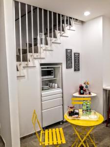 A kitchen or kitchenette at CIVICO 7 Holiday Rooms Még 18 kép