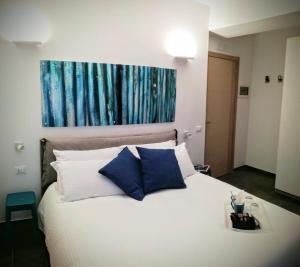 Säng eller sängar i ett rum på CIVICO 7 Holiday Rooms