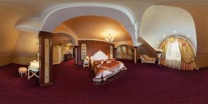 Posteľ alebo postele v izbe v ubytovaní Hotel Elefant