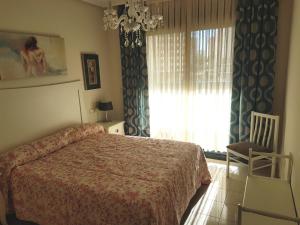 Posteľ alebo postele v izbe v ubytovaní GEMELOS 26 APARTMENTS - Benidormland