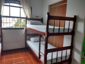 Postel nebo postele na pokoji v ubytování Hostel365