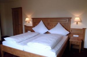 Postel nebo postele na pokoji v ubytování Hotel Jägerhof
