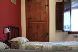 Postel nebo postele na pokoji v ubytování Casa Labata