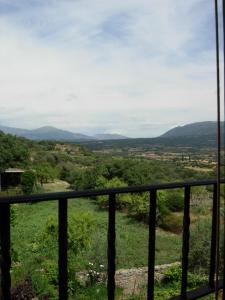 a view of the mountains from the balcony of a house at Casa Labata in Adahuesca