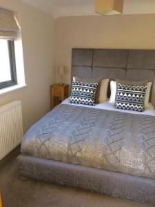 Ένα ή περισσότερα κρεβάτια σε δωμάτιο στο Hesmonds Oast Lodge