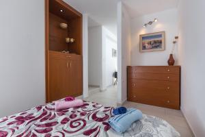 Кровать или кровати в номере Apartments Luna