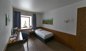 Кровать или кровати в номере Jägerhof