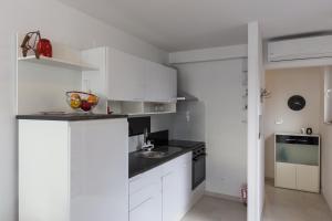 Кухня или мини-кухня в Apartments Luna
