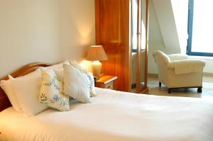 Voodi või voodid majutusasutuse The Waterfront Hotel toas