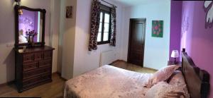Postel nebo postele na pokoji v ubytování Casa El Cabrero