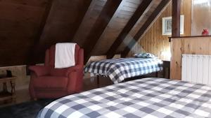 מיטה או מיטות בחדר ב-Hotelet de Betlan