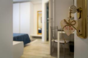 Postel nebo postele na pokoji v ubytování B&B La Rinascita