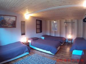 Postel nebo postele na pokoji v ubytování Mikulas Guest House