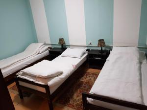 Ein Bett oder Betten in einem Zimmer der Unterkunft Hostel Mimi