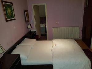 Ein Bett oder Betten in einem Zimmer der Unterkunft Hostel Mimi
