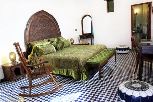 Postel nebo postele na pokoji v ubytování Riad Alya